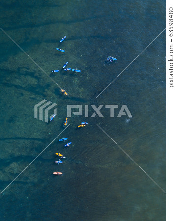 Aerial view of surfers Aerial view of surfers 63598480