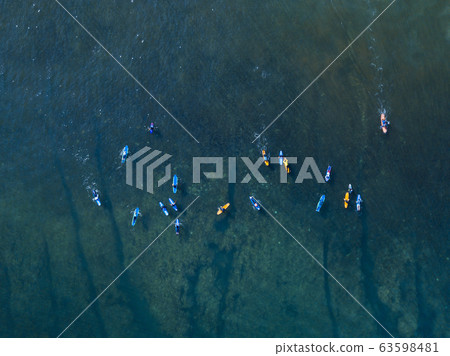 Aerial view of surfers Aerial view of surfers 63598481