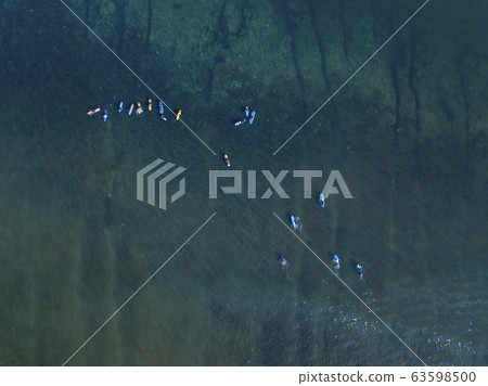 Aerial view of surfers Aerial view of surfers 63598500