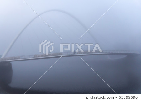 Gateshead Millennium Bridge shrouded in fog Gateshead Millennium Bridge shrouded in fog 63599690