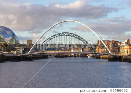 Gateshead Millennium and Tyne Bridge over the Gateshead Millennium and Tyne Bridge over the 63599692