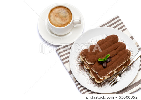 Classic tiramisu dessert on ceramic plate and cup of coffee isolated on white background with clipping path Classic tiramisu dessert on ceramic plate and cup of coffee isolated on white background with clipping path 63600352