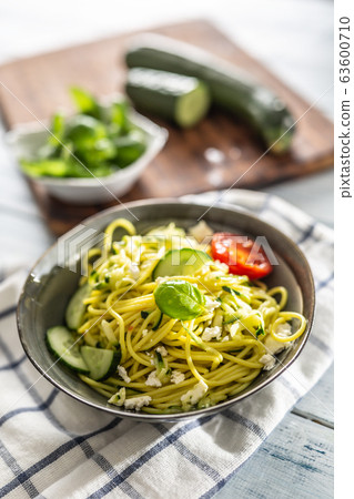 Spaghetti zucchini raw vegan pasta with feta 63600710