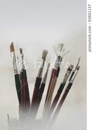 Art brushes close-up in a light haze. Creative idea in art concept. 63601137