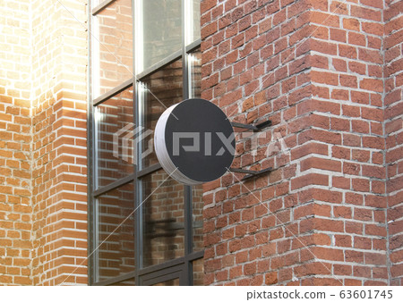Blank black outdoor round box mockup brick wall mounted Blank black outdoor round box mockup brick wall mounted 63601745