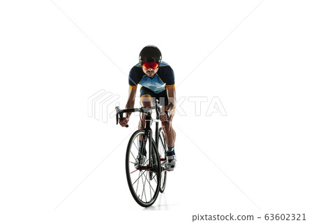 Triathlon male athlete cycle training isolated on white studio background Triathlon male athlete cycle training isolated on white studio background 63602321