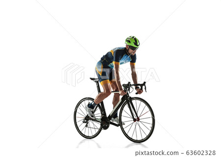 Triathlon male athlete cycle training isolated on white studio background 63602328