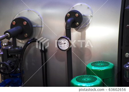 pressure gauge psi meter in pipe and valves of 63602656