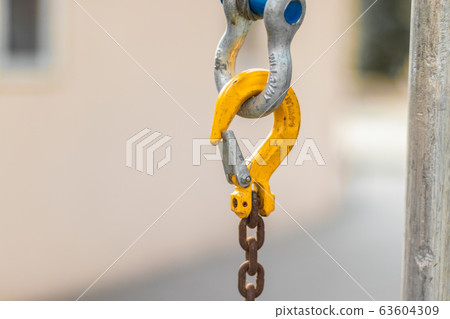 Brown chain links with yellow carabiner 63604309