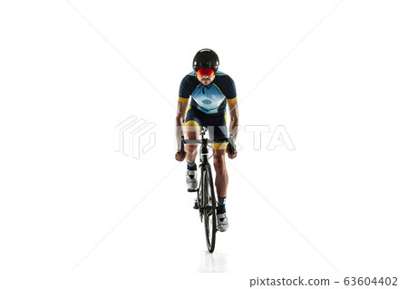 Triathlon male athlete cycle training isolated on white studio background 63604402