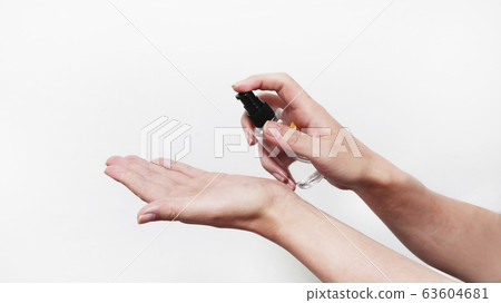 Use hand sanitizer for cleanliness and prevention of infection 63604681