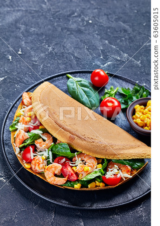 Portion of classic asian thick pancake with shrimp 63605015