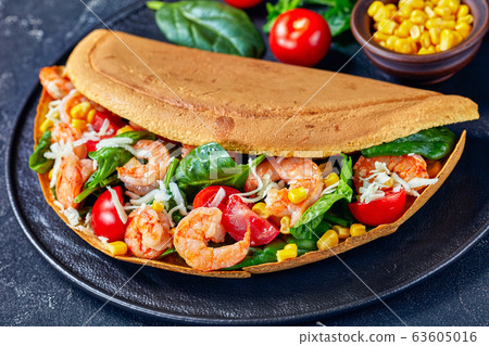 Singapore thick pancake with shrimps fresh spinach Singapore thick pancake with shrimps fresh spinach 63605016