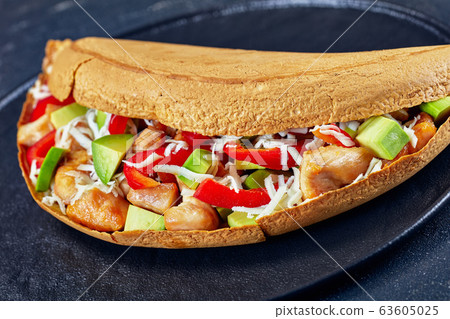 Malaysian pancake with avocado, chicken and cheese Malaysian pancake with avocado, chicken and cheese 63605025