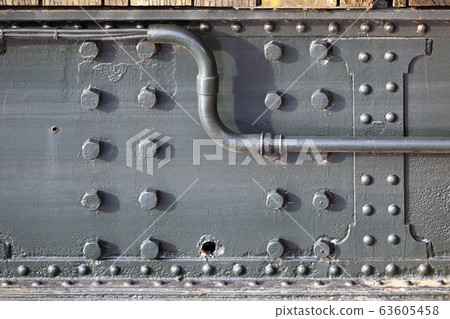 Steel bridge construction closeup with rivets and Steel bridge construction closeup with rivets and 63605458