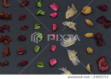 Fragrant potpourri on black background, top view. Geometric background. 63605723
