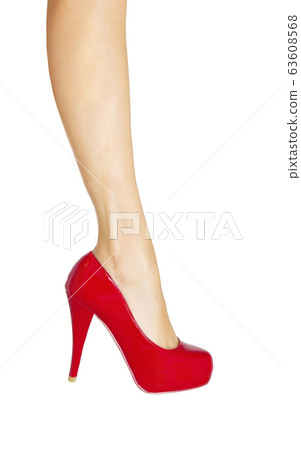 female legs wearing high heels isolated female legs wearing high heels isolated 63608568