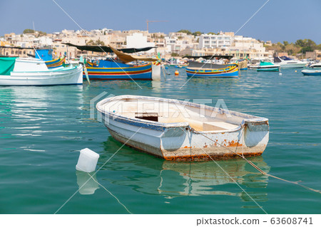 Fishing boat is moored in Marsaxlokk, Malta Fishing boat is moored in Marsaxlokk, Malta 63608741