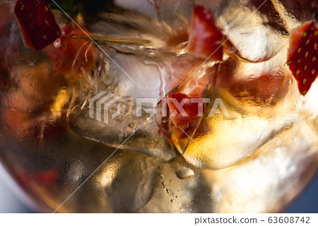 refreshing coctail with strawberries isolated on a 63608742