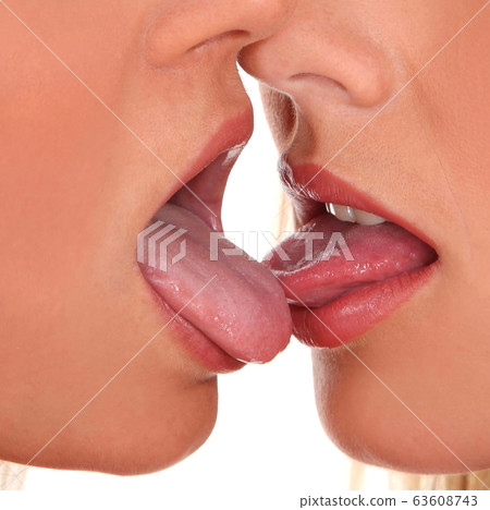 Closeup of pair women mouths kissing 63608743