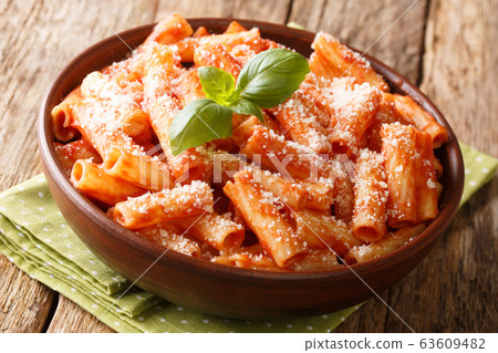 Italian homemade Tortiglioni pasta with parmesan Italian homemade Tortiglioni pasta with parmesan 63609482