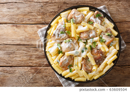 Italian dinner of pasta Tortiglioni with chicken Italian dinner of pasta Tortiglioni with chicken 63609504