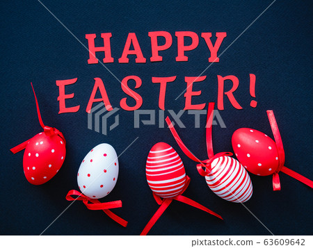 Happy Easter background with eggs and paper text Happy Easter background with eggs and paper text 63609642