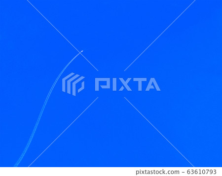 Airplane upwards and trail in clear blue sky 63610793