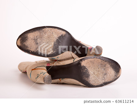 Leather sole in need of repair after prolonged 63611214