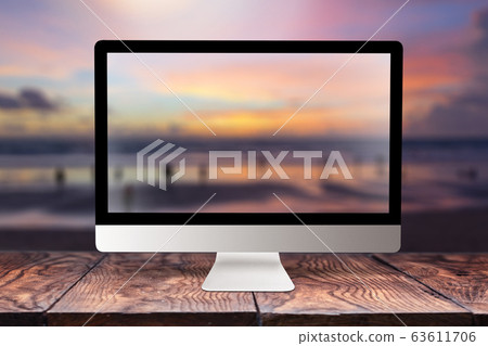 Computer screen with blurred sea background. 63611706