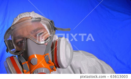 Scientist virologist in respirator. Man close up look, wearing protective medical mask. Concept health safety N1H1 coronavirus epidemic 2019 nCoV. 63613003