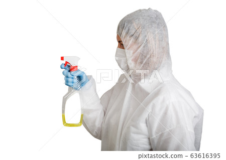 Woman in protective gloves and suit making 63616395