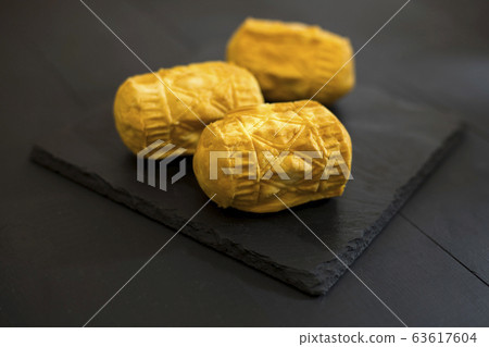 oscypki, oscypek,Smoked cheese, traditional food in Podhale, Poland oscypki, oscypek,Smoked cheese, traditional food in Podhale, Poland 63617604