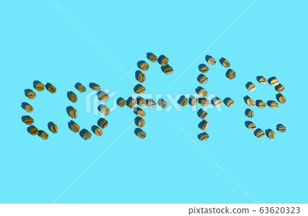 The word coffee written in grains on a blue background 63620323
