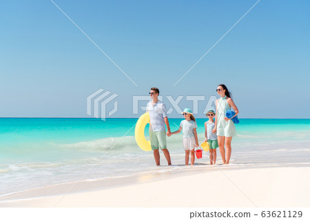Young family on vacation have a lot of fun Young family on vacation have a lot of fun 63621129