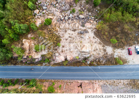 Aerial photo from flying drone of asphalt road. Aerial photo from flying drone of asphalt road. 63622695