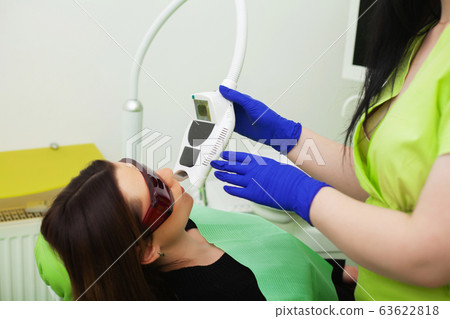 Pretty young girl at a reception in the dental office 63622818