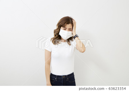 Asian woman wear protective face mask Asian woman wear protective face mask 63623354