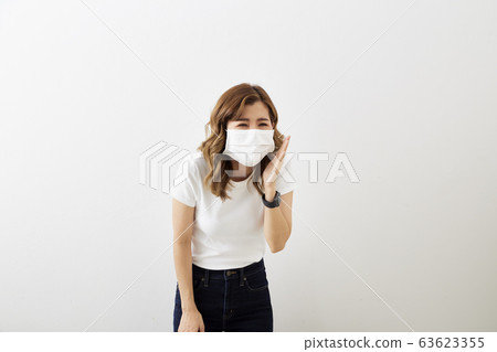 Asian woman wear protective face mask 63623355
