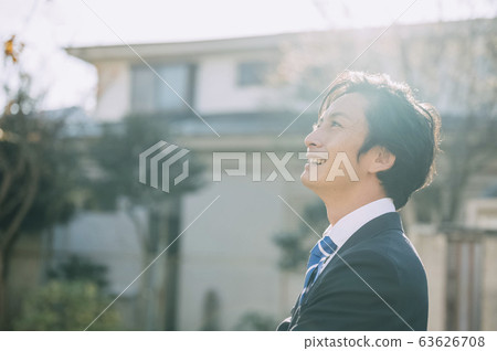 Businessman in the park Businessman in the park 63626708