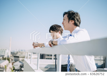 Businessman on the rooftop Businessman on the rooftop 63626752