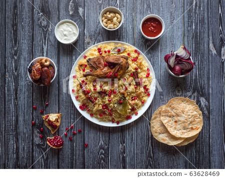 Arabic traditional food bowls Kabsa with meat Arabic traditional food bowls Kabsa with meat 63628469