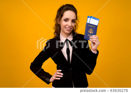 Business Woman Holding Tickets And Passport On Business Woman Holding Tickets And Passport On 63630278