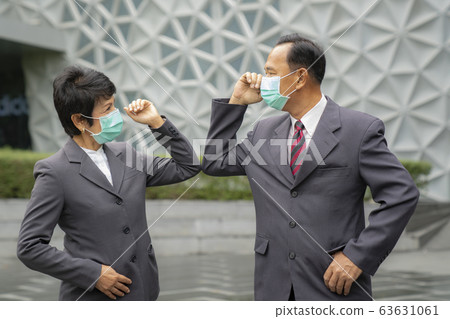 Old asian business people greeting togather by new 63631061