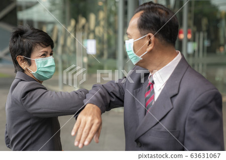 Old asian business people greeting togather by new 63631067