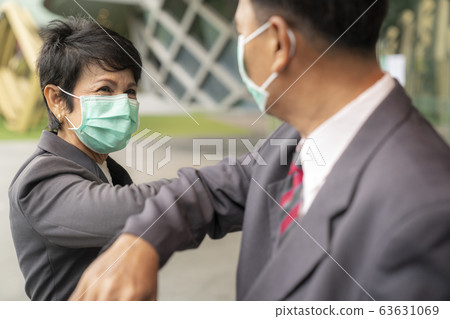 Old asian business people greeting togather by new 63631069