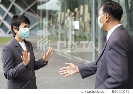 Old asian business people no greeting by 63631071