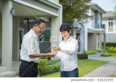 Old people in asia usd alcohol gel cleaning her 63631095