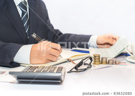 Male manager putting his ideas and writing 63632080