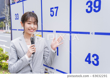 Young woman giving an election speech 63632291